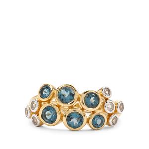 Midas Ring That includes London Blue Topaz and White Zircon, Whole Gem Weight 1.70 Carats